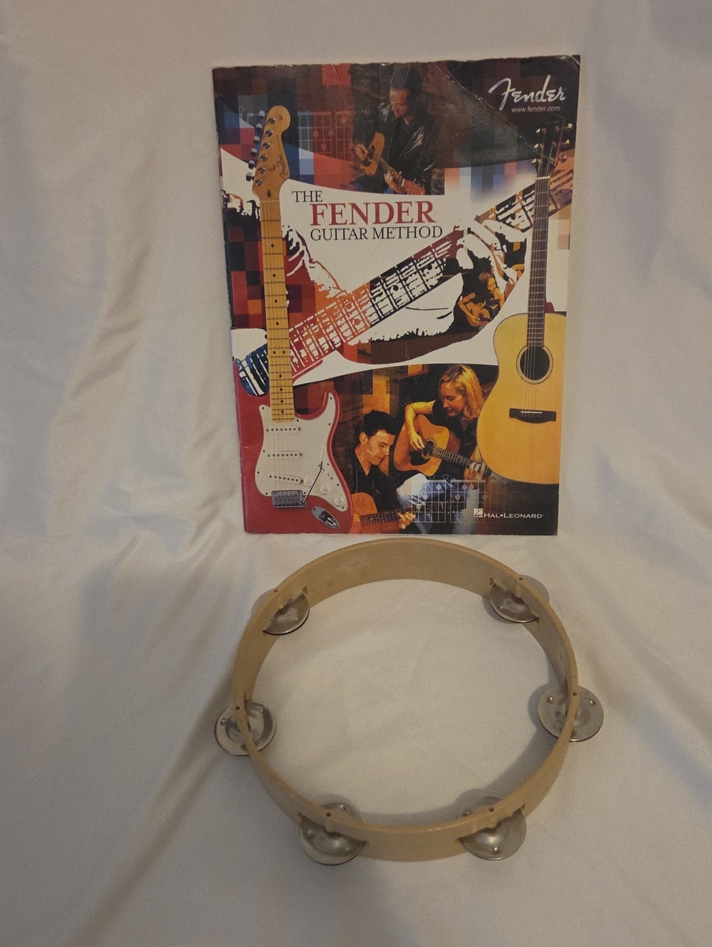 Fender Guitar Book & Beige Tambourine with Metal Jingles